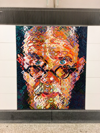 One of two Chuck Close self-portraits at the 86th Street station